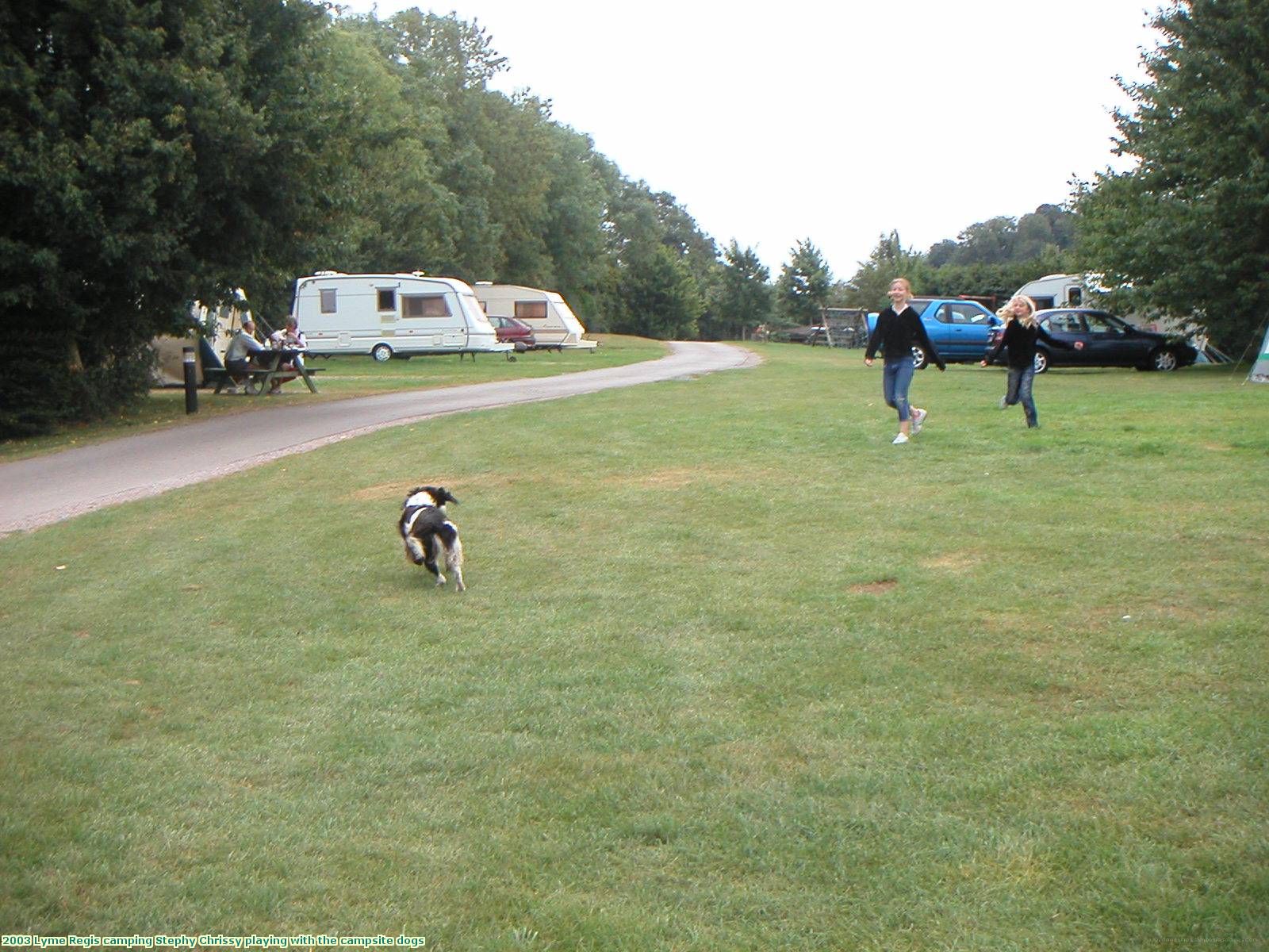 2003 Lyme Regis camping Stephy Chrissy playing with the campsite dogs