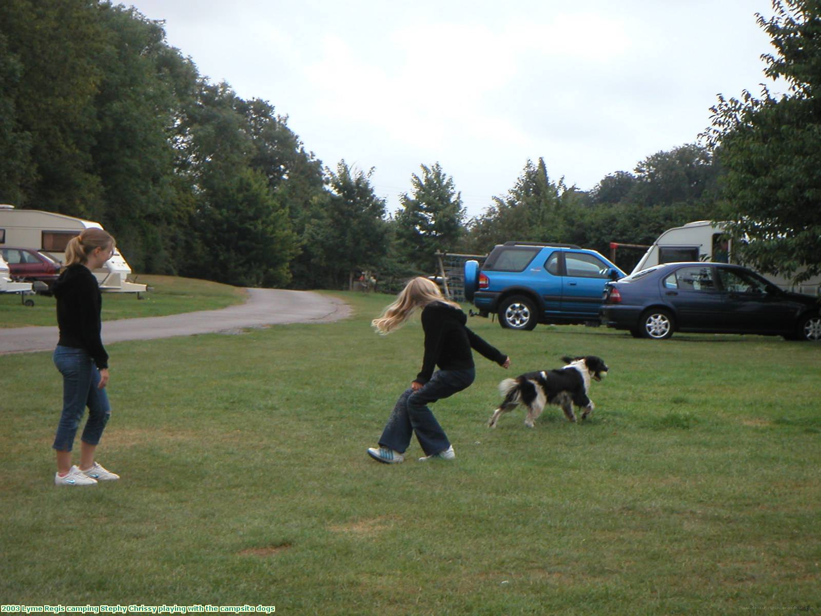 2003 Lyme Regis camping Stephy Chrissy playing with the campsite dogs