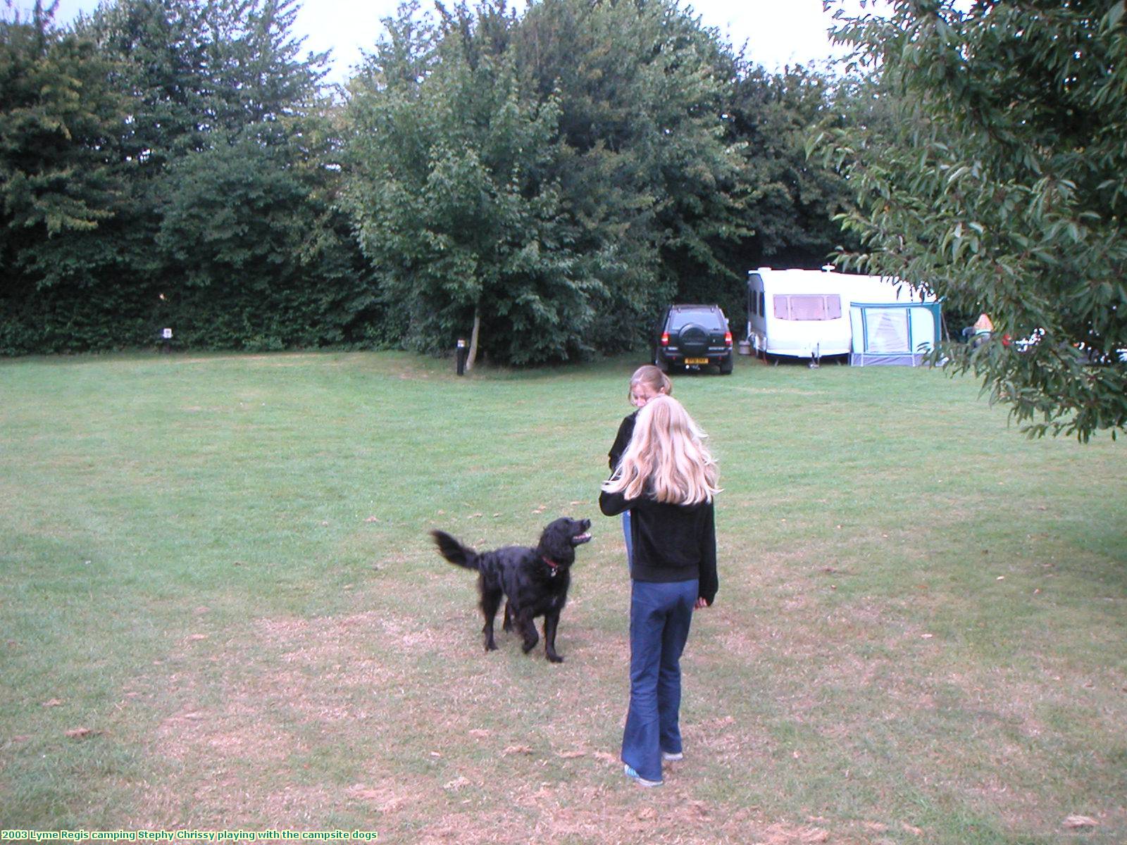 2003 Lyme Regis camping Stephy Chrissy playing with the campsite dogs