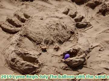  lymejuly 2019 Lyme Regis July The balloon with the sand crab